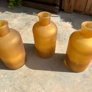 6 Orange vases